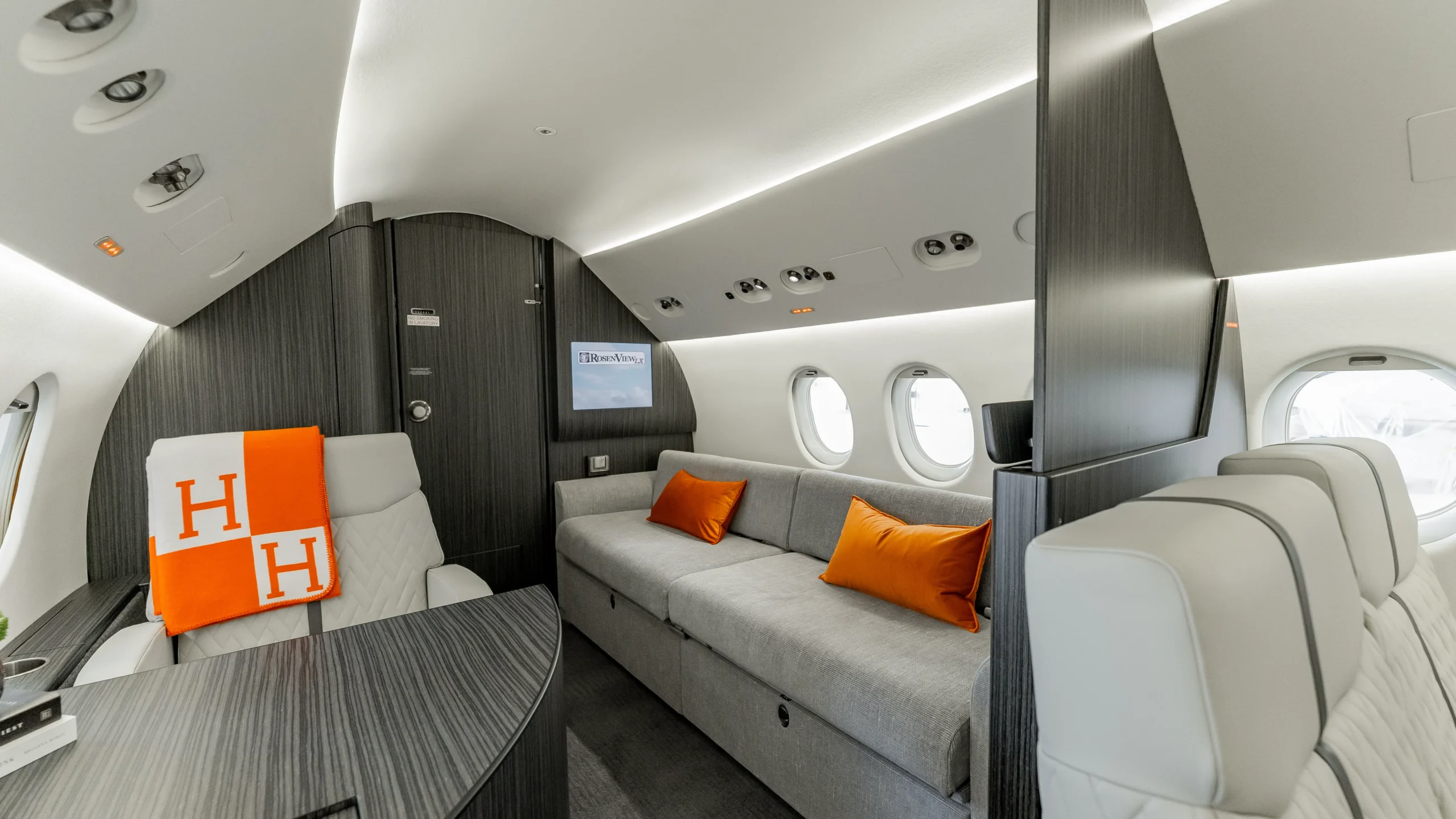 Falcon 900B cabin — dining and conference
